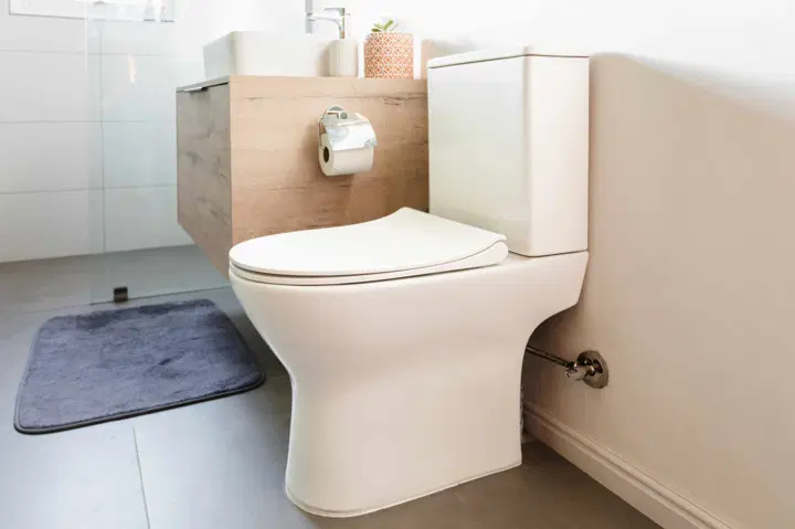 Clean modern toilet ready for professional installation
